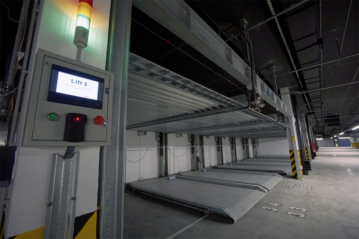 Двухуровневые консольные парковки пазлового типа в механизированном подземном паркинге